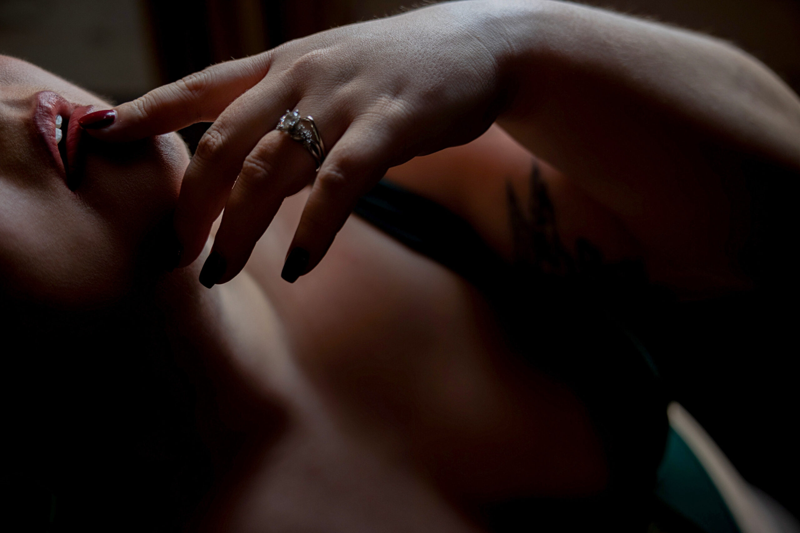 Details of a woman's finger touching her lips after visiting medspas in maryland