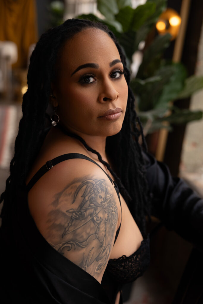 Woman wearing a silk robe during a modest DC boudoir session